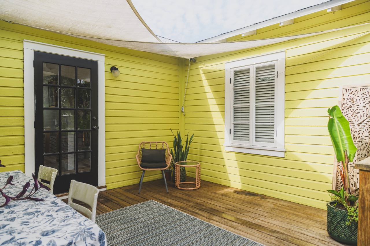 Shaded courtyard patio with sail shade