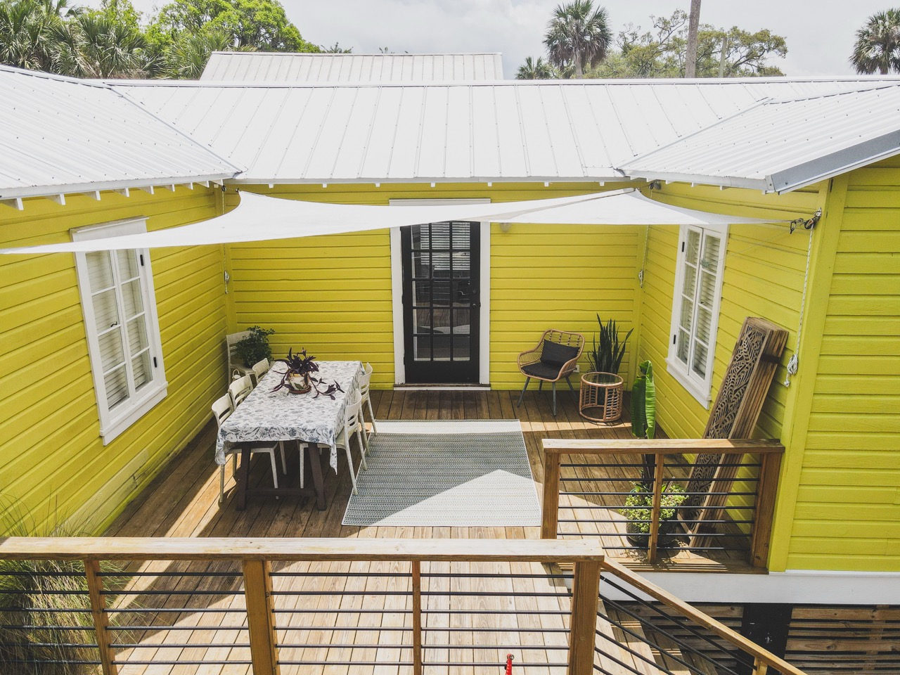 Aerial of courtyard patio between cottage wings